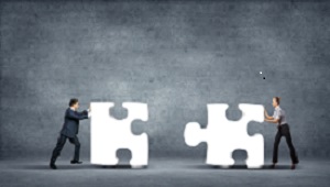 bigstock-Team-of-business-people-collab-38632897